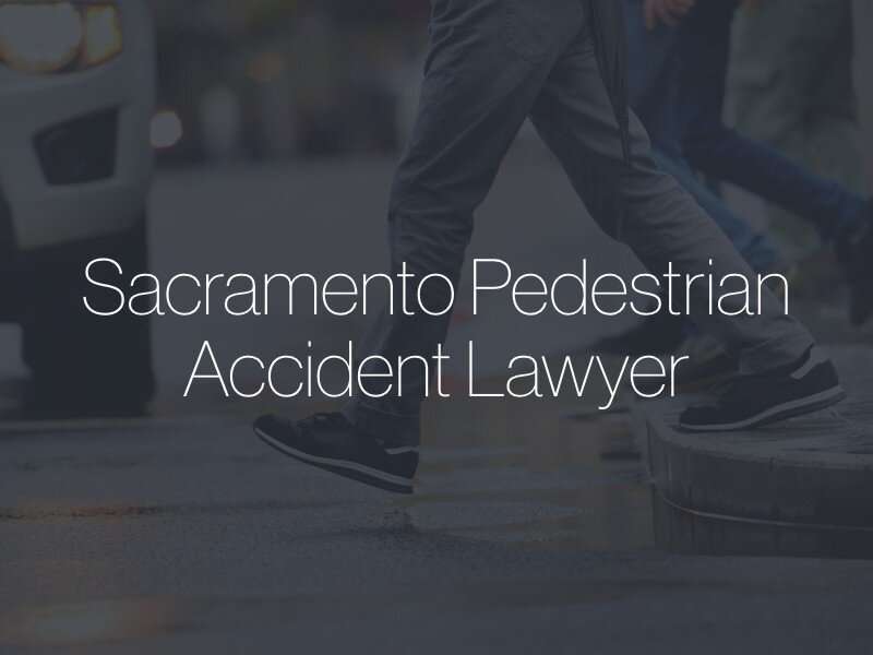 A person about to cross the street with the text "Sacramento Pedestrian Accident Lawyer" superimposed